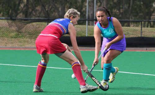 Tweed Border’s Lorelle Morrissey (right) takes on the Brisbane 1 defence in the division one veterans final. Tweed Border’s Lorelle Morrissey (right) takes on the Brisbane 1 defence in the division one veterans final.